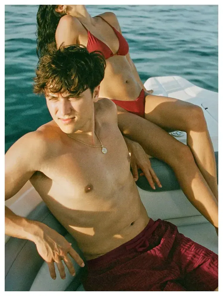 On Kelly (left) : Men’s Swim Shorts / Cherry Wine, On Ashley (right) : Kelly Top and Bottoms / Cherry Wine